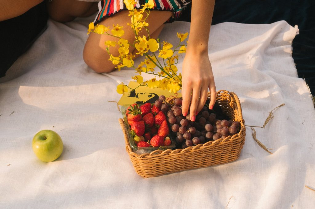 rectangular brown wicker basket with fruits