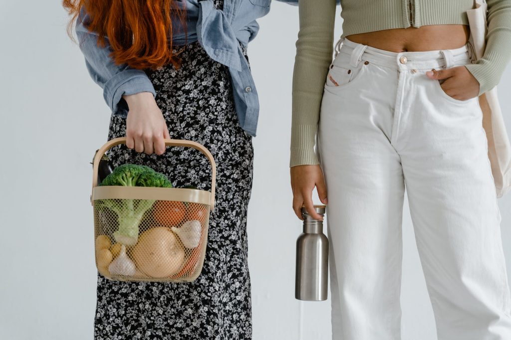 a person holding beige basket